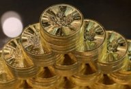 A file photo shows a part of a stack of 500 Canadian gold coins, worth $1 million USD according to Sprott Money, is displayed at the precious metals dealer's booth at the Prospectors and Developers Association of Canada (PDAC) annual conference in Toronto A file photo shows a part of a stack of 500 Canadian gold coins, worth $1 million USD according to Sprott Money, is displayed at the precious metals dealer's booth at the Prospectors and Developers Association of Canada (PDAC) annual conference in Toronto