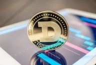 Dogecoin price prediction Dogecoin token on mobile phone screen