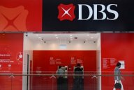 People use DBS automated teller machines (ATMs) in Singapore March 31, 2022. People use DBS automated teller machines (ATMs) in Singapore March 31, 2022.