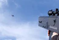 Counter-drone defence system targeting an unmanned aerial vehicle in the sky