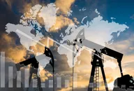 Oil pump on the background of a world map