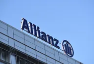 Allianz logo on the rooftop of a modern office building
