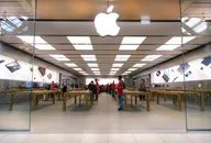 An apple divided into two halves.