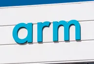 Arm Holdings logo displayed on the exterior wall of a modern building 