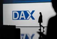A large screen displaying the DAX index logo