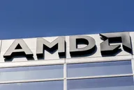 AMD logo mounted on the exterior of a modern office building