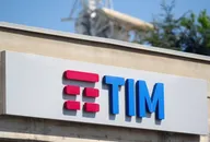 TIM logo displayed on the exterior of a telecommunications company building