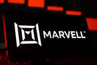 Illuminated Marvel logo on a red background.