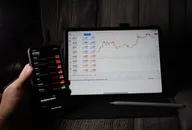 Metatrader platform open on iPad and iPhone