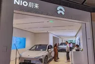 Interior of a NIO showroom with electric cars on display