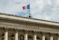 Stock exchange building, with the French flag above the facade