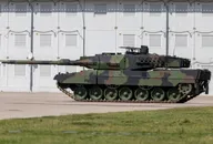 Modern German Leopard 2 battle tank on a military training ground, illustrating European defence sector trends