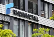 Rheinmetall logo on the facade of a modern office building