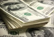 Stack of one hundred dollar bills close-up.