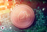 Propy price prediction: Will the real estate NFT soar high?  shiny copper PROPY cryptocurrency coin on blurry motherboard background