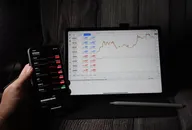 Metatrader platform open on iPad and iPhone
