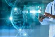 Doctor using tablet with DNA helix and code in the background