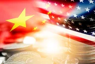USA and China flag on coins stacking