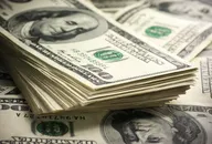 Stack of one hundred dollar bills close-up