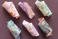 Singaporean banknotes and australian bills of different denominations