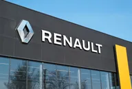 Renault dealership exterior with logo.