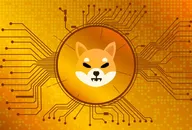 SHIB cryptocurrency logo, showing a cartoon Shiba Inu dog on a coin, over a golden orange background with circuit board graphics detail