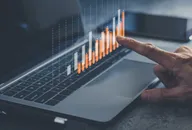 How to see what big investors are buying: Research can help to find best buys Laptop or computer with chart. Investment in business and financial concept of growth and success. Investor data analysis for planning in strategy of stock market fund. Invest f