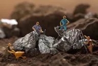 ​​Lithium price forecast: Rising EV demand to cause new highs? Mining of Tantalum, Nickel, Cobalt, lithium. Miniature worker mining metal Tantalum and silver. Mining business, Mineral Resources.