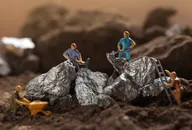 ​​Lithium price forecast: Rising EV demand to cause new highs? Mining of Tantalum, Nickel, Cobalt, lithium. Miniature worker mining metal Tantalum and silver. Mining business, Mineral Resources.