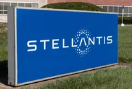 Stellantis corporate sign in front of a modern office building exterior.