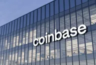 coinbase Signage Logo on Top of Glass Building. 