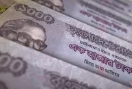 Bangladeshi taka notes in a row