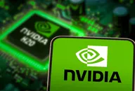 Nvidia logo displayed on a smartphone in front of an Nvidia-branded computer chip
