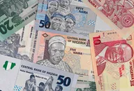 Nigeria money, heap of various naira banknotes, African nigerian currency