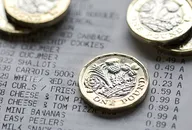 One Pound Coins on a Till Receipt