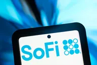 Close-up of a smartphone screen displaying the SoFi logo against a blurred blue background