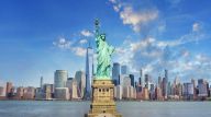 The Statue of Liberty with a New York backdrop.