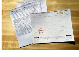 Tax concept with tax forms and calendar