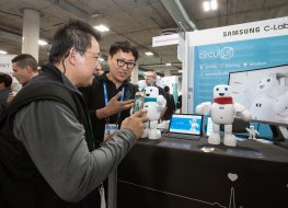 People visit the Samsung booth at CES 2022