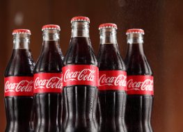 Five Coca-Cola bottles 