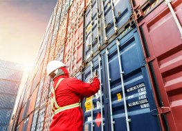 Cargo Foreman checking freight containers on a cargo ship