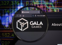 A magnifying glass enlarges the Gala Games name and icon