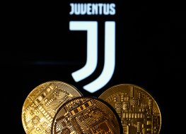 Representation of cryptocurrency in front of Juventus football club logo