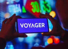 In this photo illustration, the Voyager Digital logo is displayed on a smartphone screen