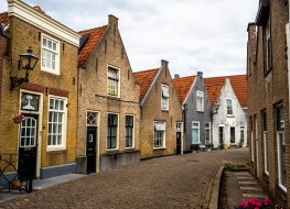 Traditional Dutch houses in a small village placed in South Holland