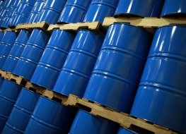 Blue oil drums stacked in a warehouse in Indiana, U.S