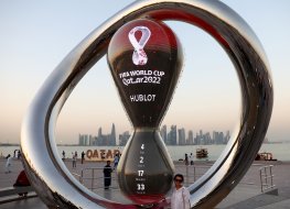 A fan poses in the Corniche area ahead of FIFA World Cup Qatar 2022 
