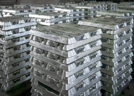 Stacks of aluminium bars in a factory