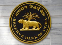 Plaque with RBI logo hangs on wall of the central bank’s HQ in Mumbai 