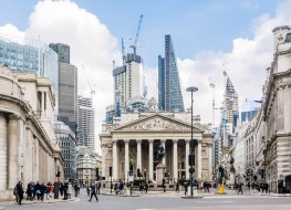 Street in City of London with Royal Exchange, Bank of England and new modern skyscrapers